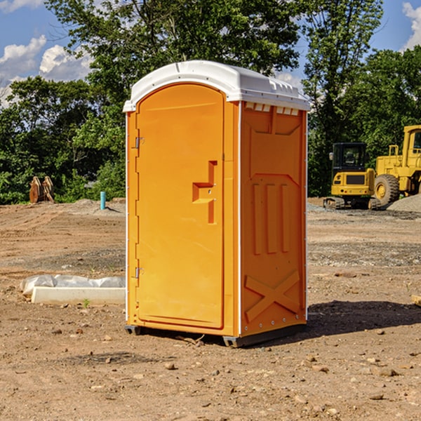 how often are the portable restrooms cleaned and serviced during a rental period in Saline